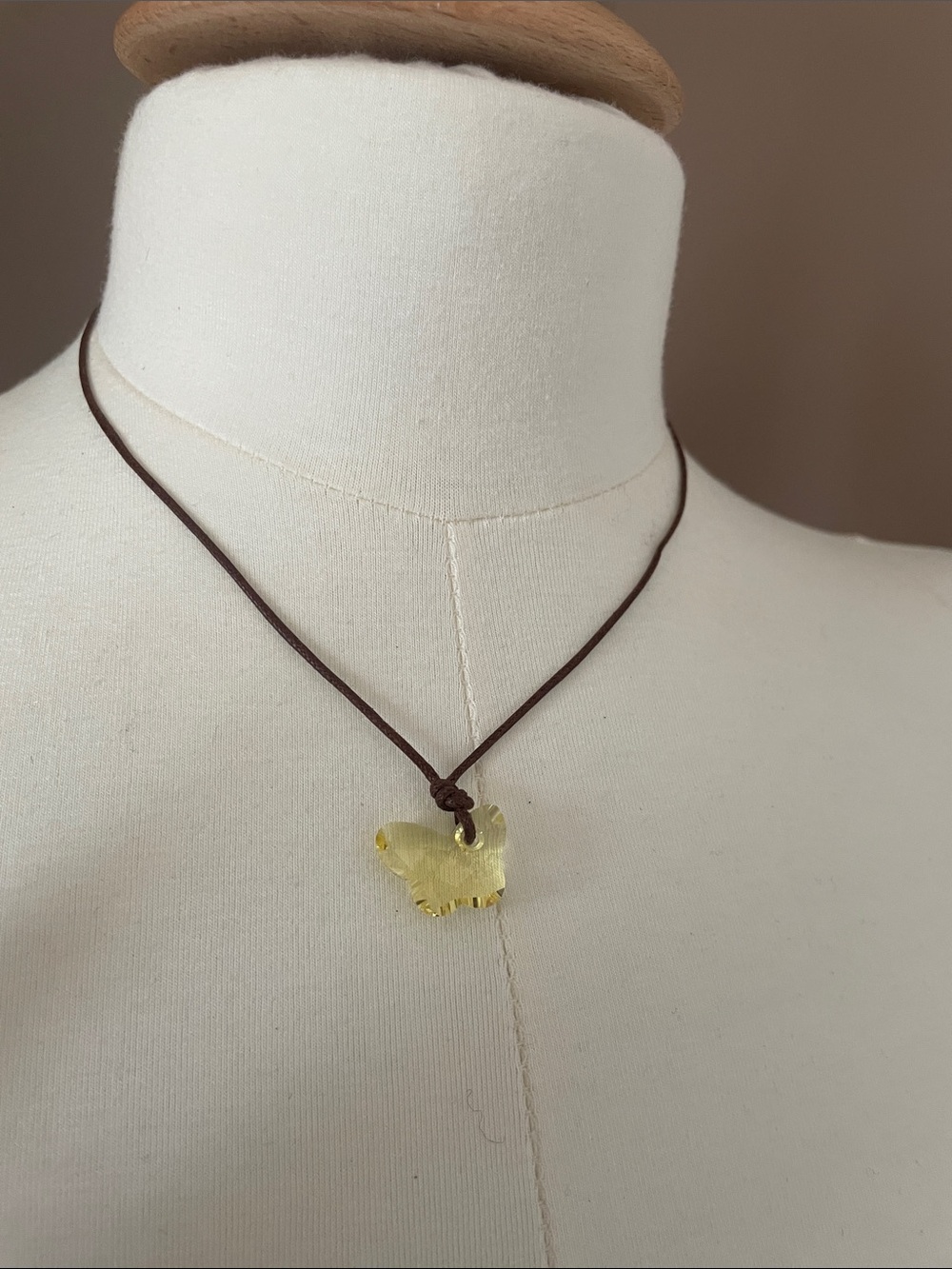 Swarovski Yellow Butterfly Pendant on Brown  Cord new in box !!